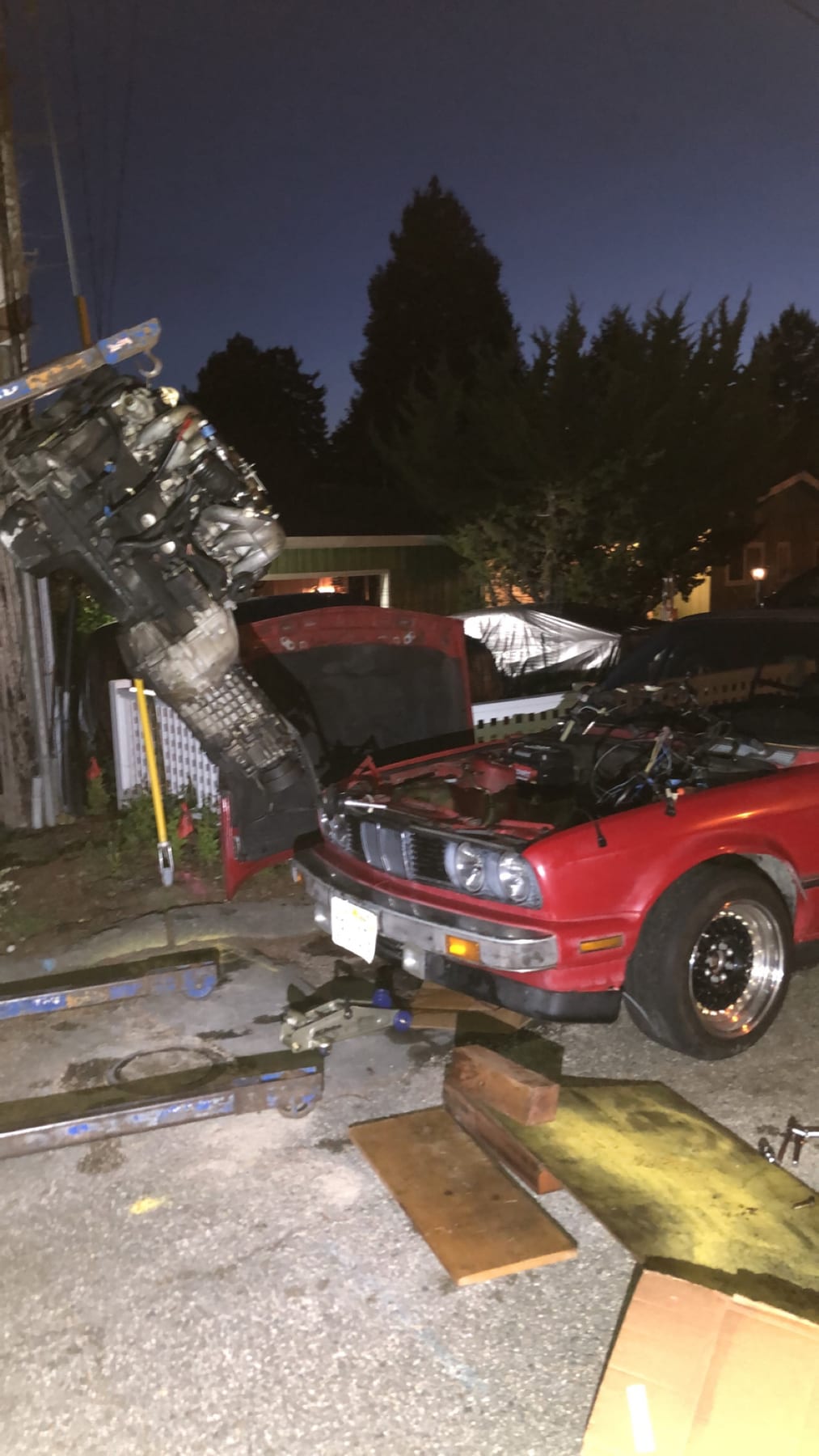 Removing the original engine from the BMW E30